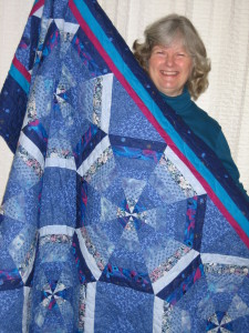 Susan Tripp won Mary Jo's handmade quilt at the auction awhile back